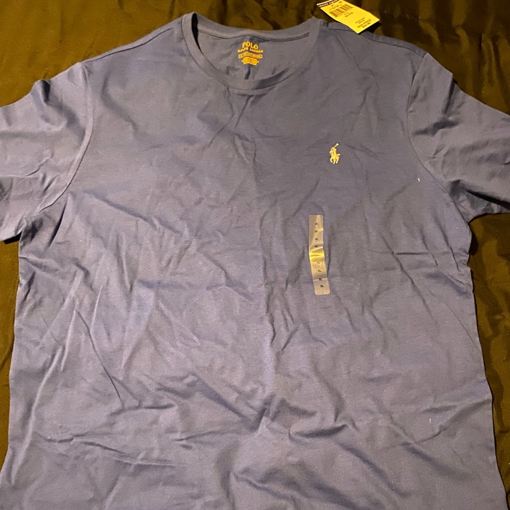Polo v-neck short sleeve t-shirt, white signature pony on the side.